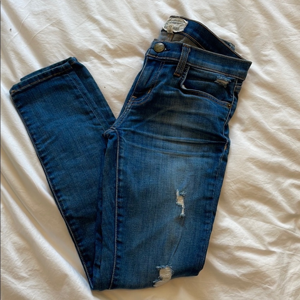 Low rise stretch distressed skinny jeans